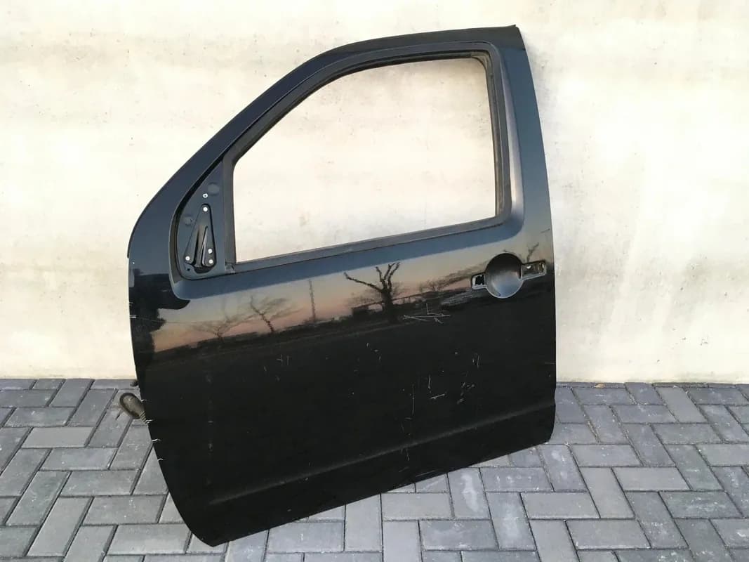 Puerta delantera izq Nissan Navara D40 - Foto 2