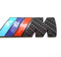 EMBLEMA TRASERO BMW M CARBONO