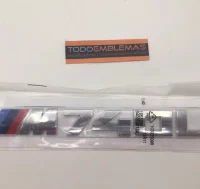 EMBLEMA TRASERO BMW M740LI PLATA.