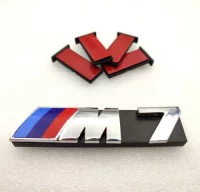 EMBLEMA PARRILLA BMW M7 PLATA MODELO NUEVO P104.7