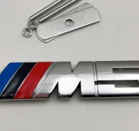 EMBLEMA PARRILLA BMW M5 PLATA