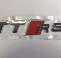 EMBLEMA LETRAS AUDI PLATEADAS TTRS