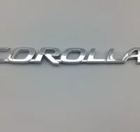 EMBLEMA TRASERO TOYOTA COROLLA